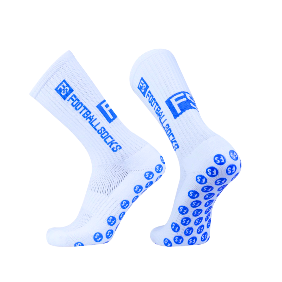 Weiße Fußballsocken mit Blauer aufschrift: Footballsocks.
Blaue Silikonnoppen an der Sohle