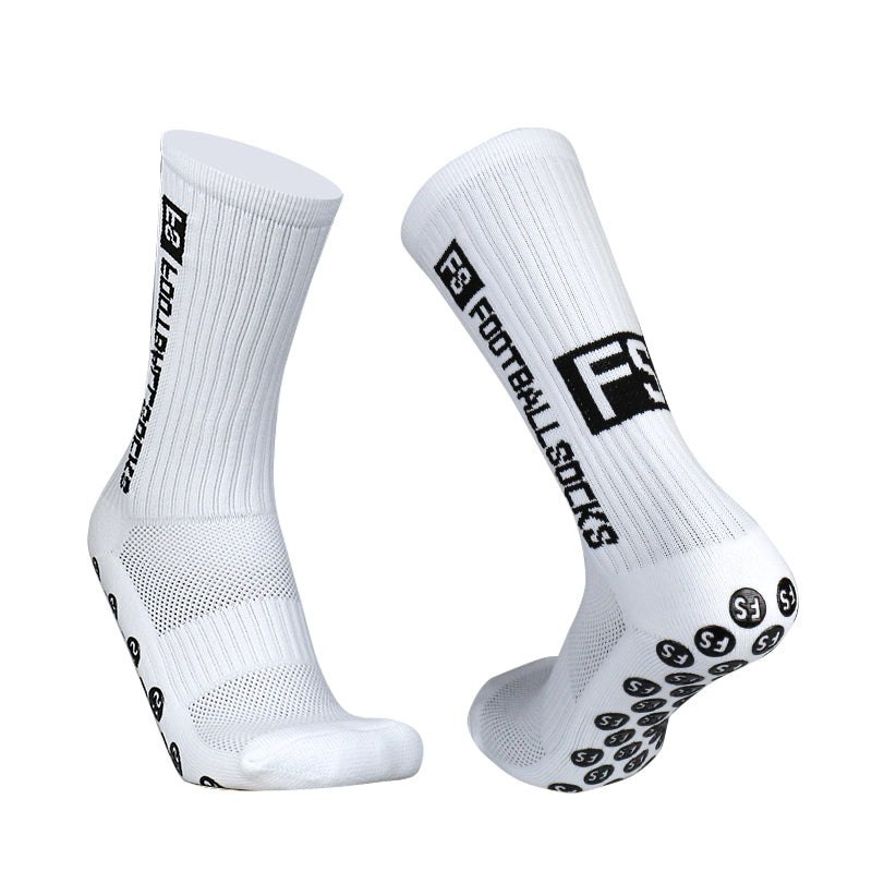 Weiße Fußballsocke oben groß mit schwarzen Grip-Noppen auf der Unterseite