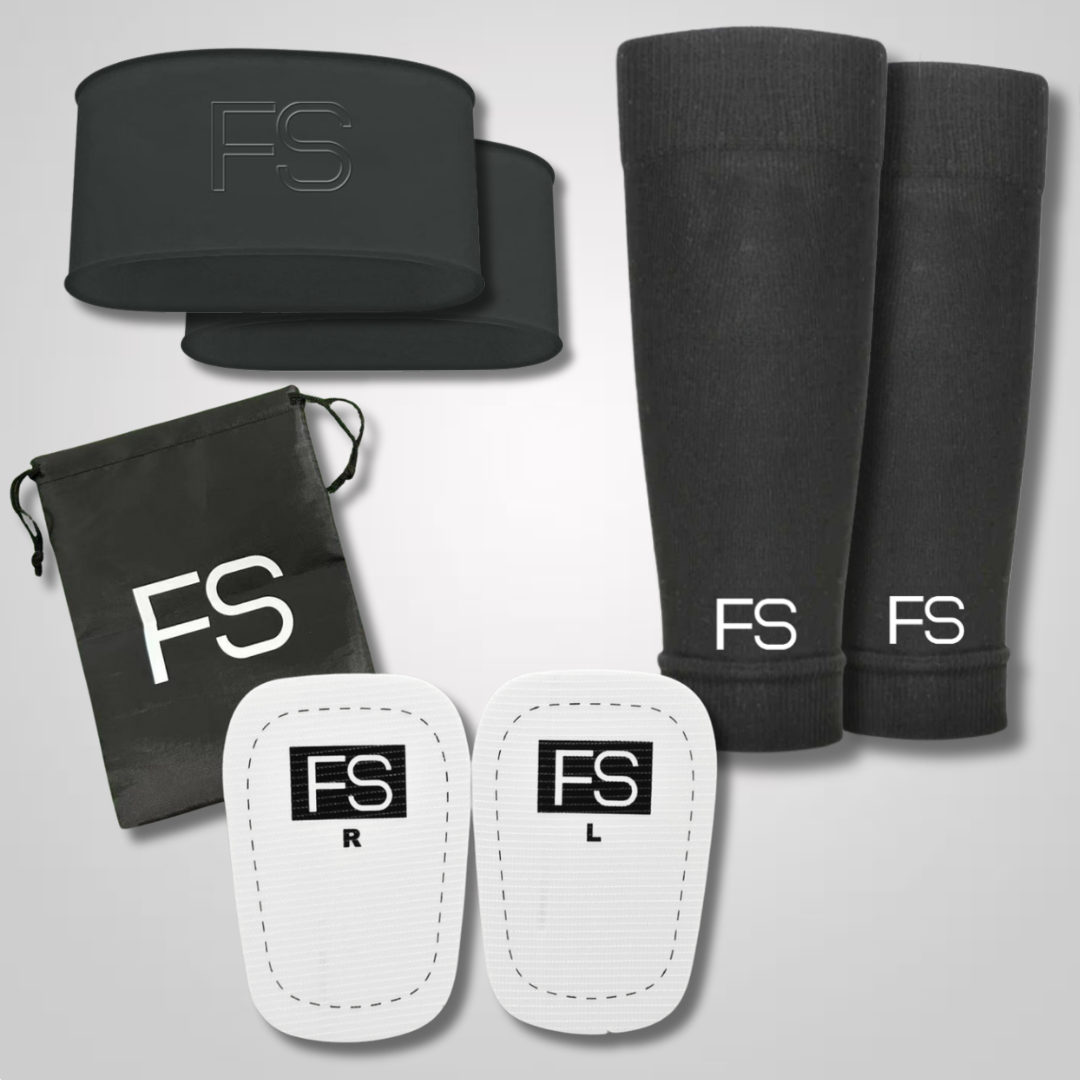 Bild vom Essential Set: Zu sehen: FS Silikon Tapes in Schwarz, Schwarze Tubes (offene Stutzen mit weißem FS Logo unten), weiße Schienbeinschoner + dazugehöriger Beutel in schwarz